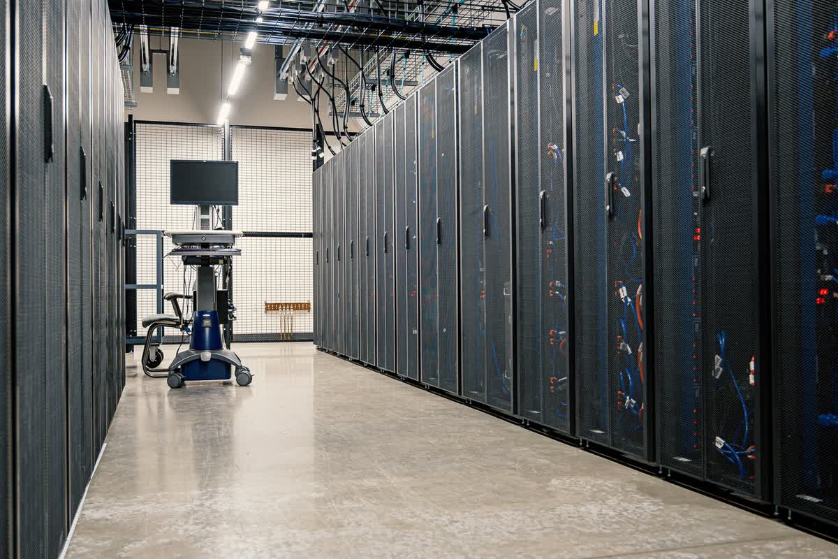 Steel-framed server racks in a data center: an illustrative image for digital and data infrastructure.