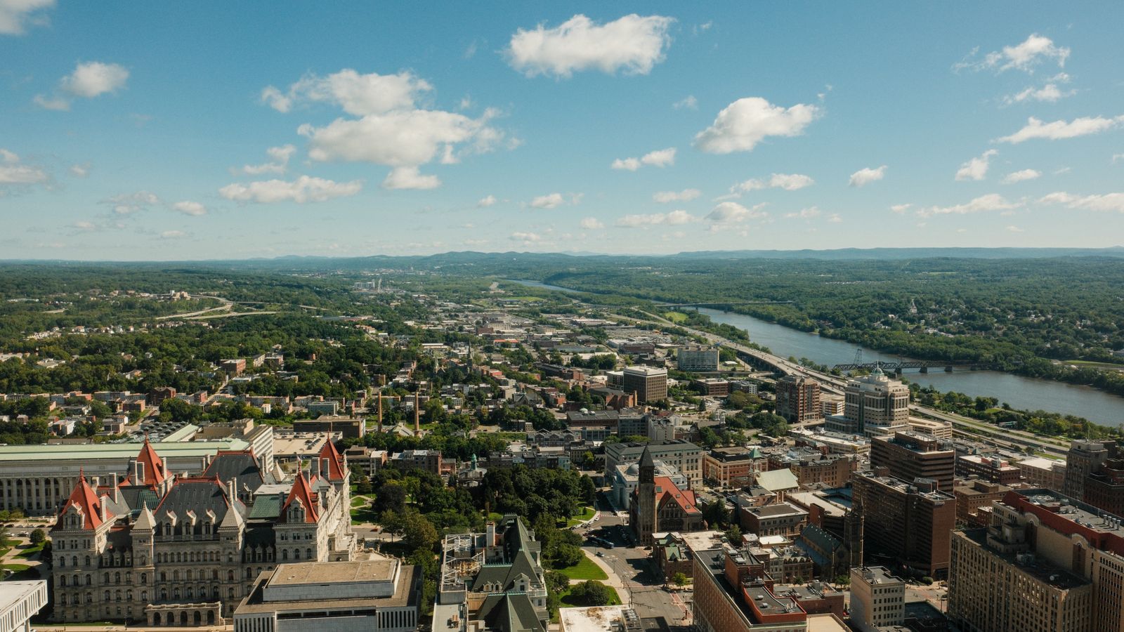 Aerial view of the New York State Capitol and the Hudson River in Albany, an illustrative image for the firm's Albany service area.
