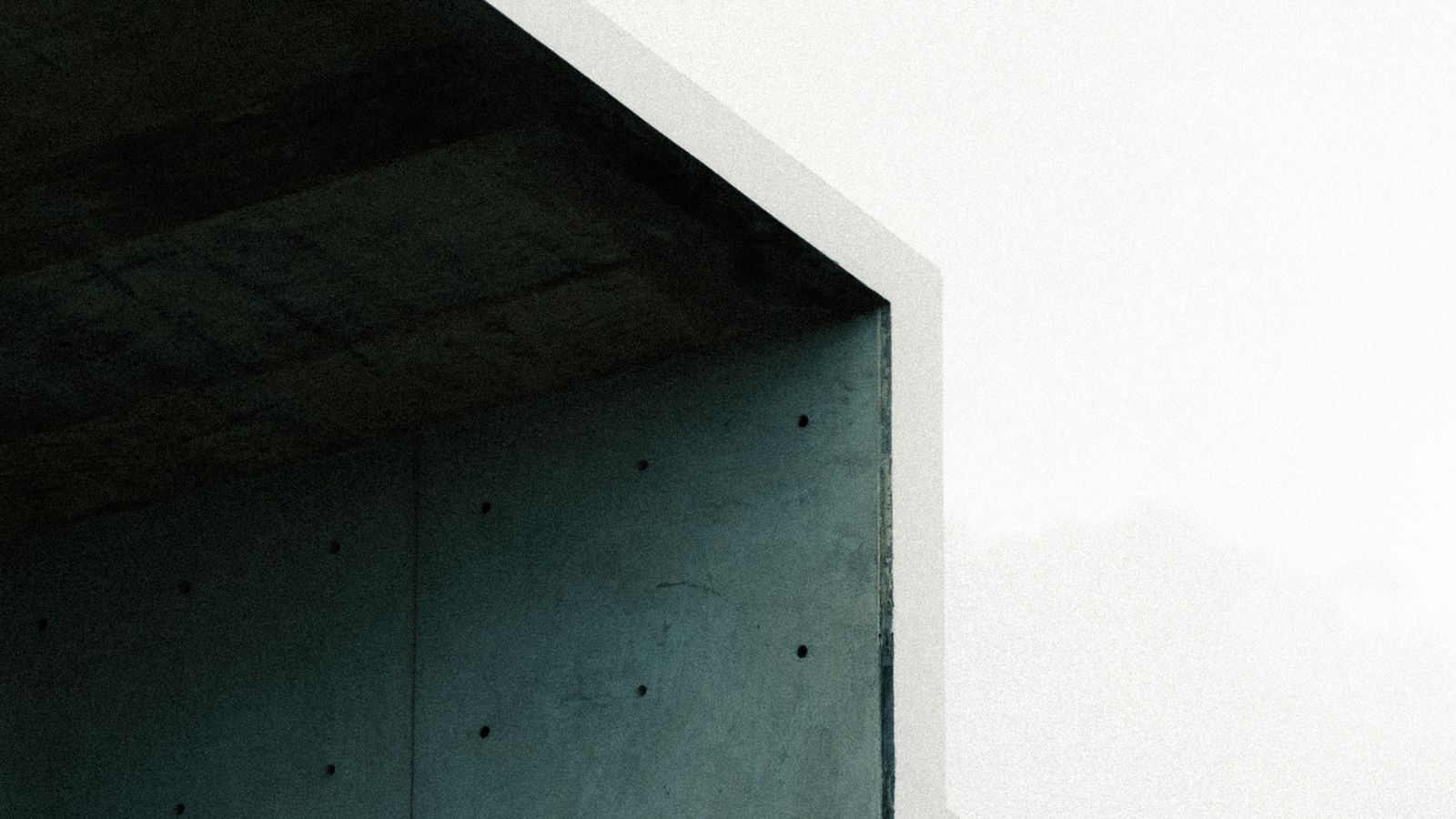 A raw concrete structure with repeated openings, an illustrative image for inspecting what holds and what fails.
