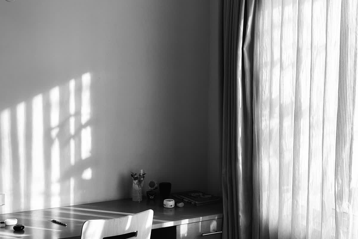A minimalist, empty home-office space: an illustrative image for a direct, founder-led practice.