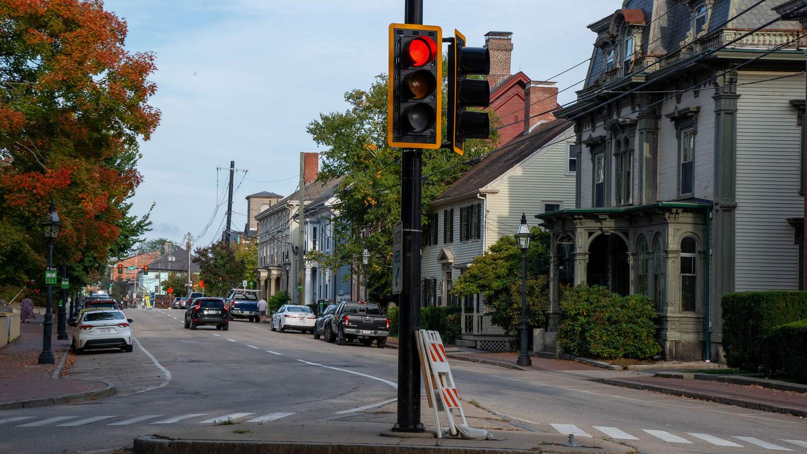A historic street corner in Portsmouth, New Hampshire in early autumn: an illustrative image of New England, not a photograph of this place.